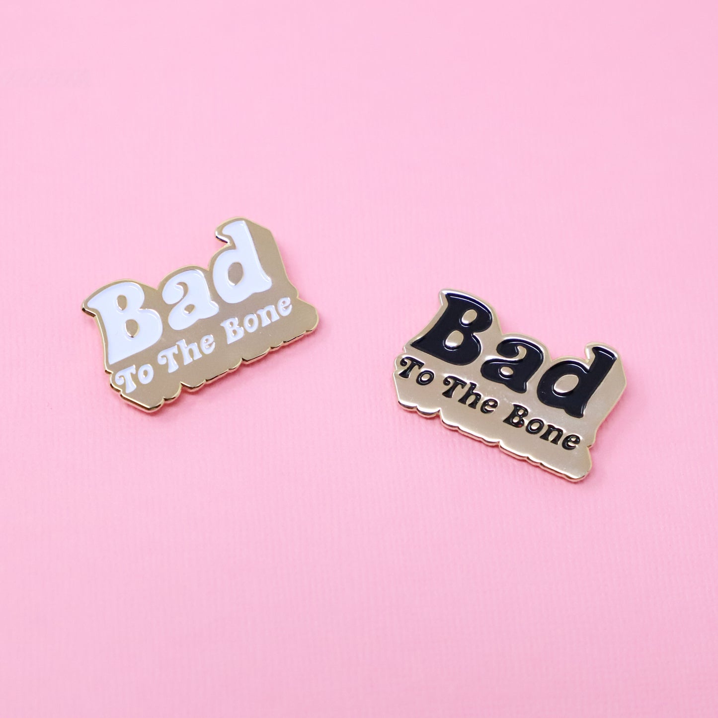 Bad to the bone enamel pin