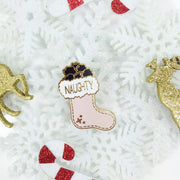 Naughty Christmas enamel pin