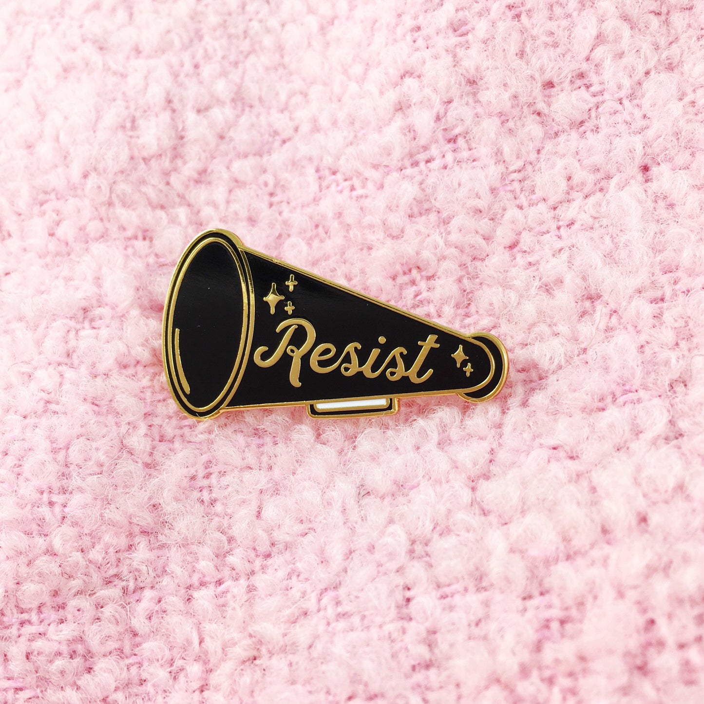 Resist enamel pin